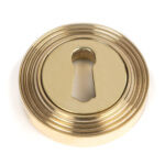 polished brass round escutcheon (beehive)