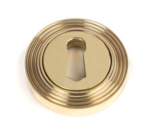 polished brass round escutcheon (beehive)
