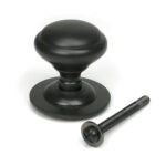 aged bronze round centre door knob