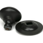 aged bronze round centre door knob