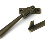 burnished brass night vent locking newbury fastener