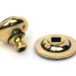 aged brass round centre door knob