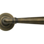 burnished brass newbury lever on rose set (plain)