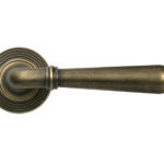 burnished brass newbury lever on rose set (beehive)