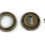 burnished brass round escutcheon (beehive)
