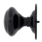 black round centre door knob