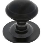 black round centre door knob
