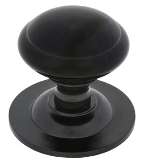 black round centre door knob