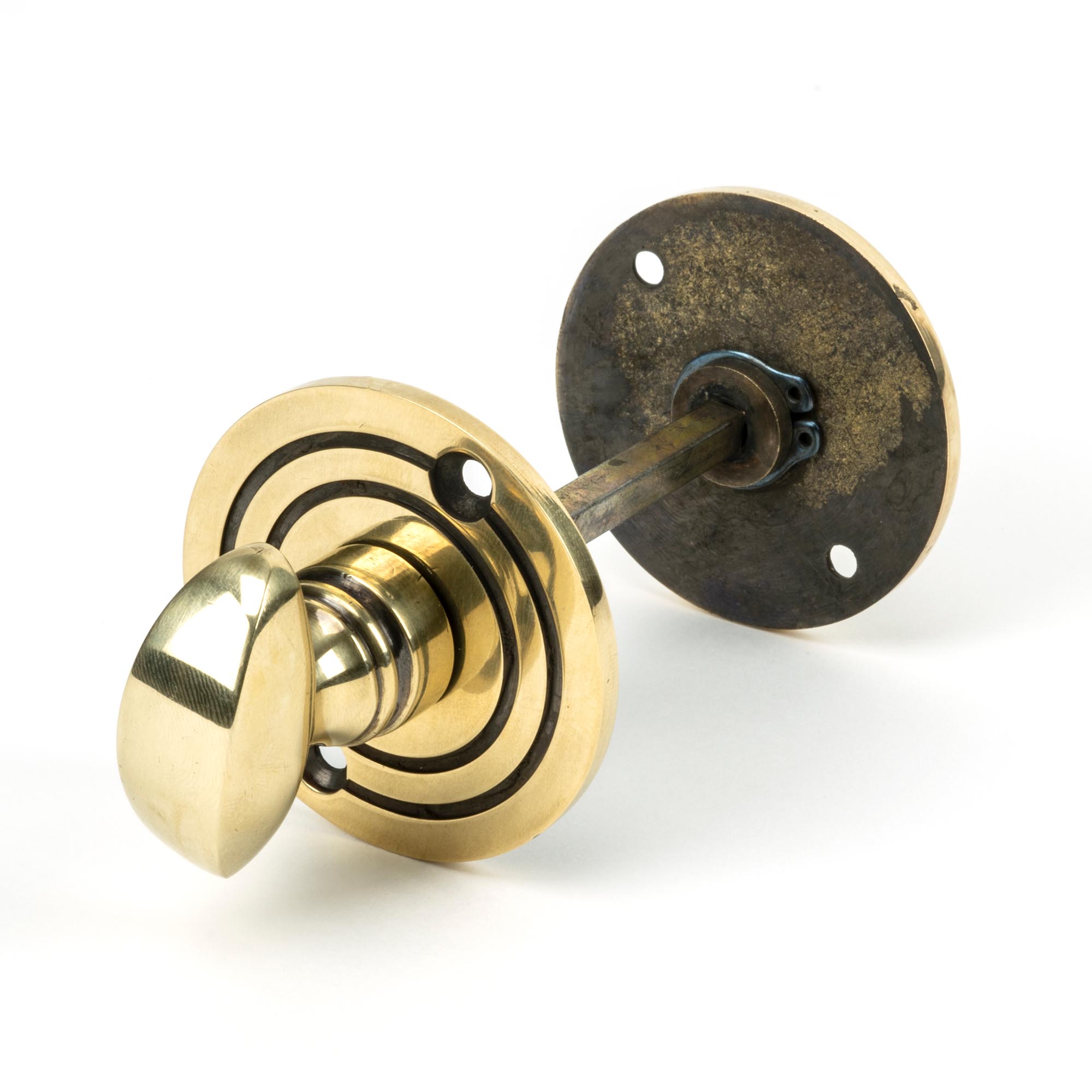 aged brass round bathroom thumbturn