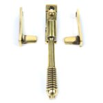 aged brass night vent locking reeded fastener