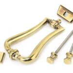 aged brass slimline art deco door knocker