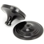 black art deco centre door knob