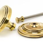 aged brass art deco centre door knob