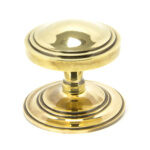 aged brass art deco centre door knob