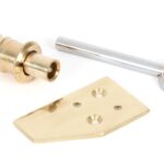 polished brass key flush sash stop