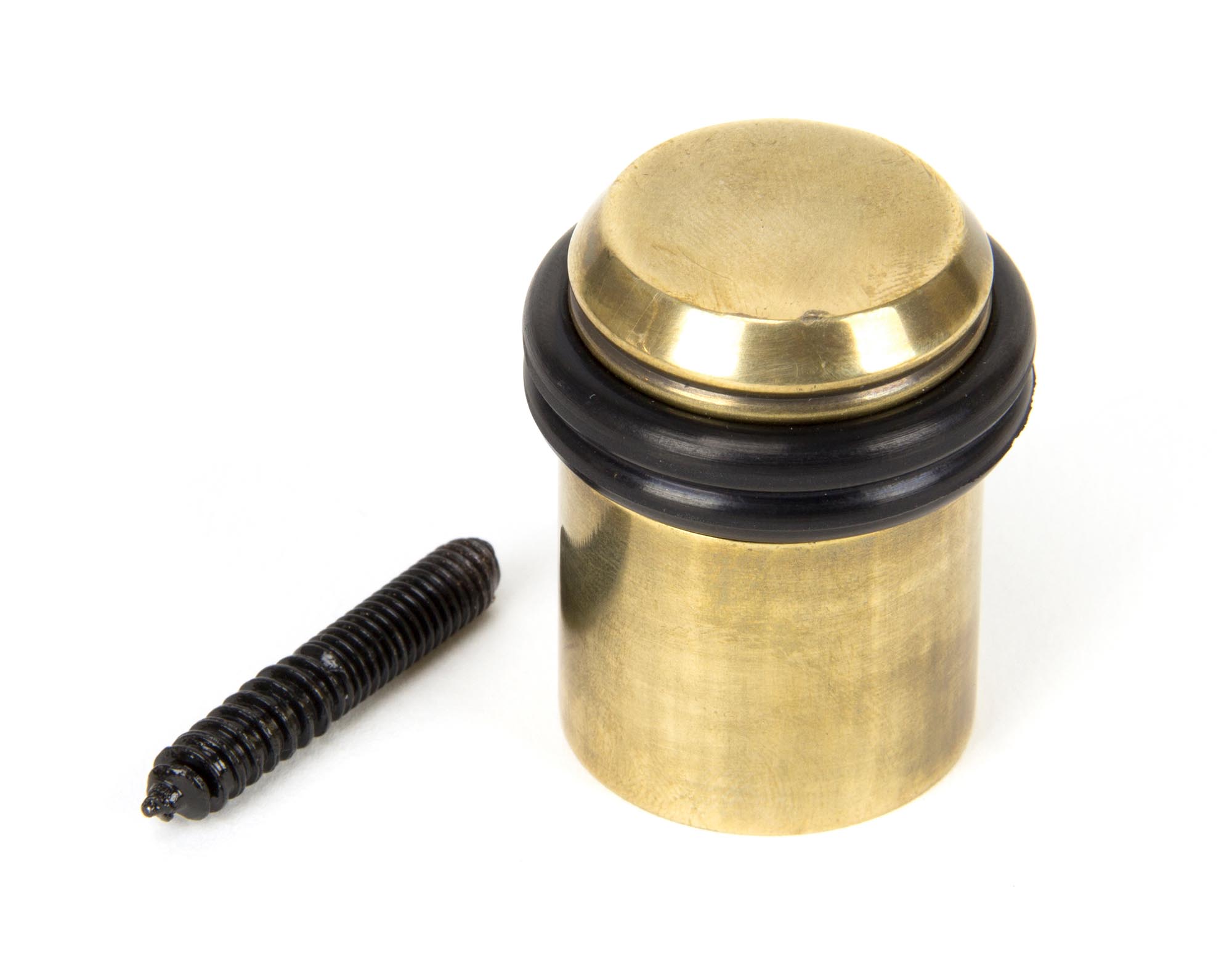 aged brass floor mounted door stop