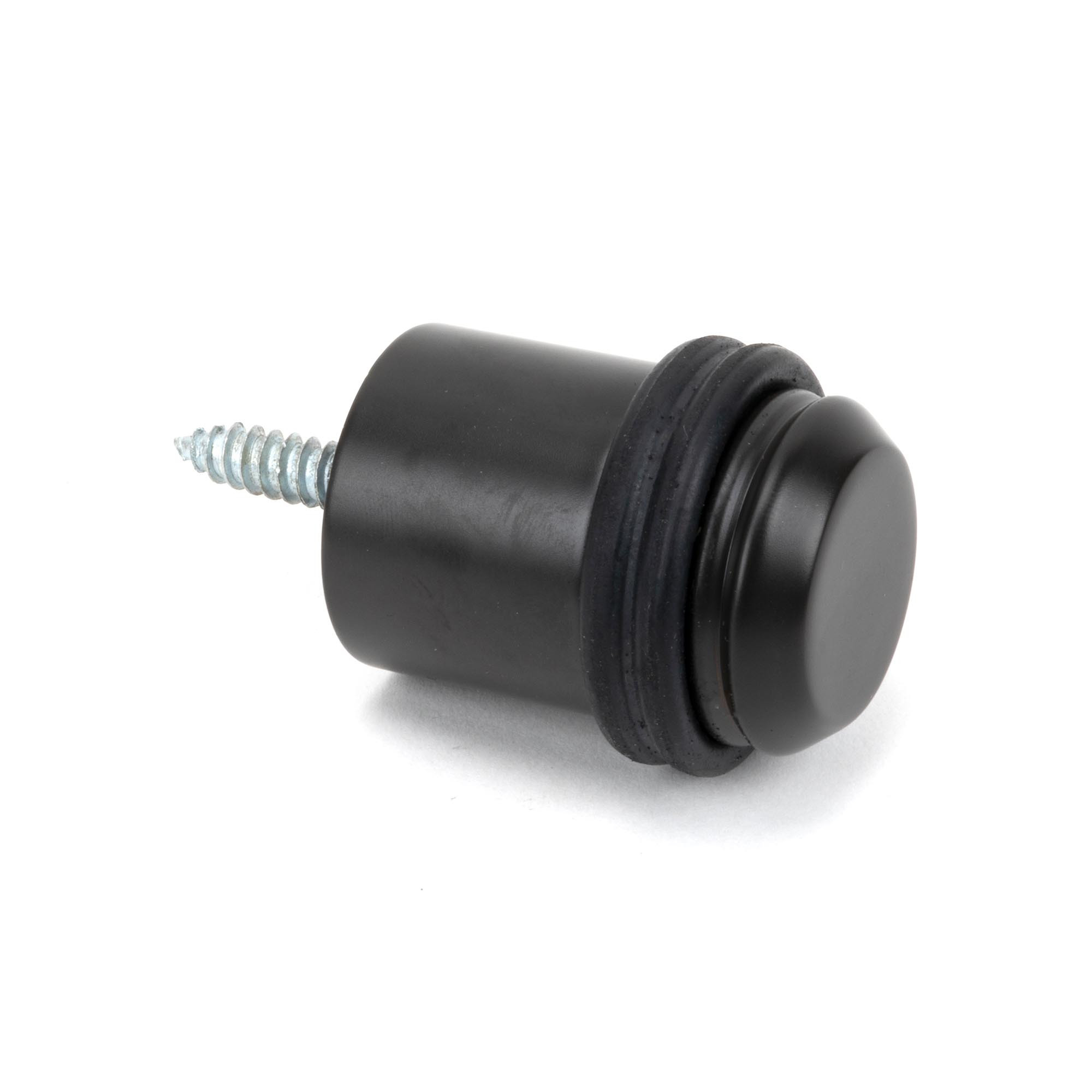 aged bronze floor mounted door stop