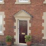 aged brass small letter plate