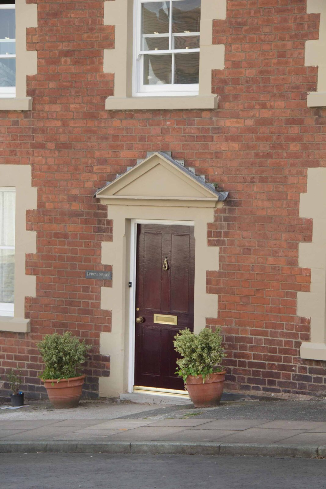 aged brass small letter plate