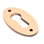 polished bronze oval escutcheon