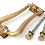 polished bronze slimline art deco door knocker