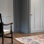 polished bronze floor mounted door stop