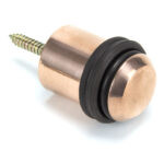 polished bronze floor mounted door stop