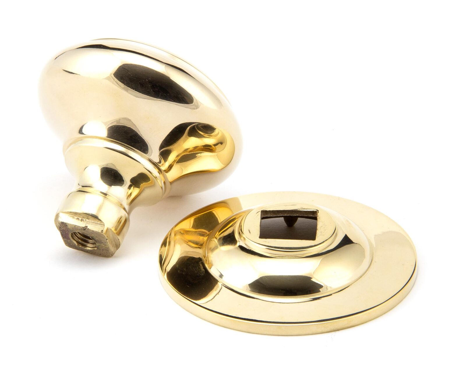 polished brass round centre door knob