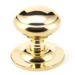 polished brass round centre door knob