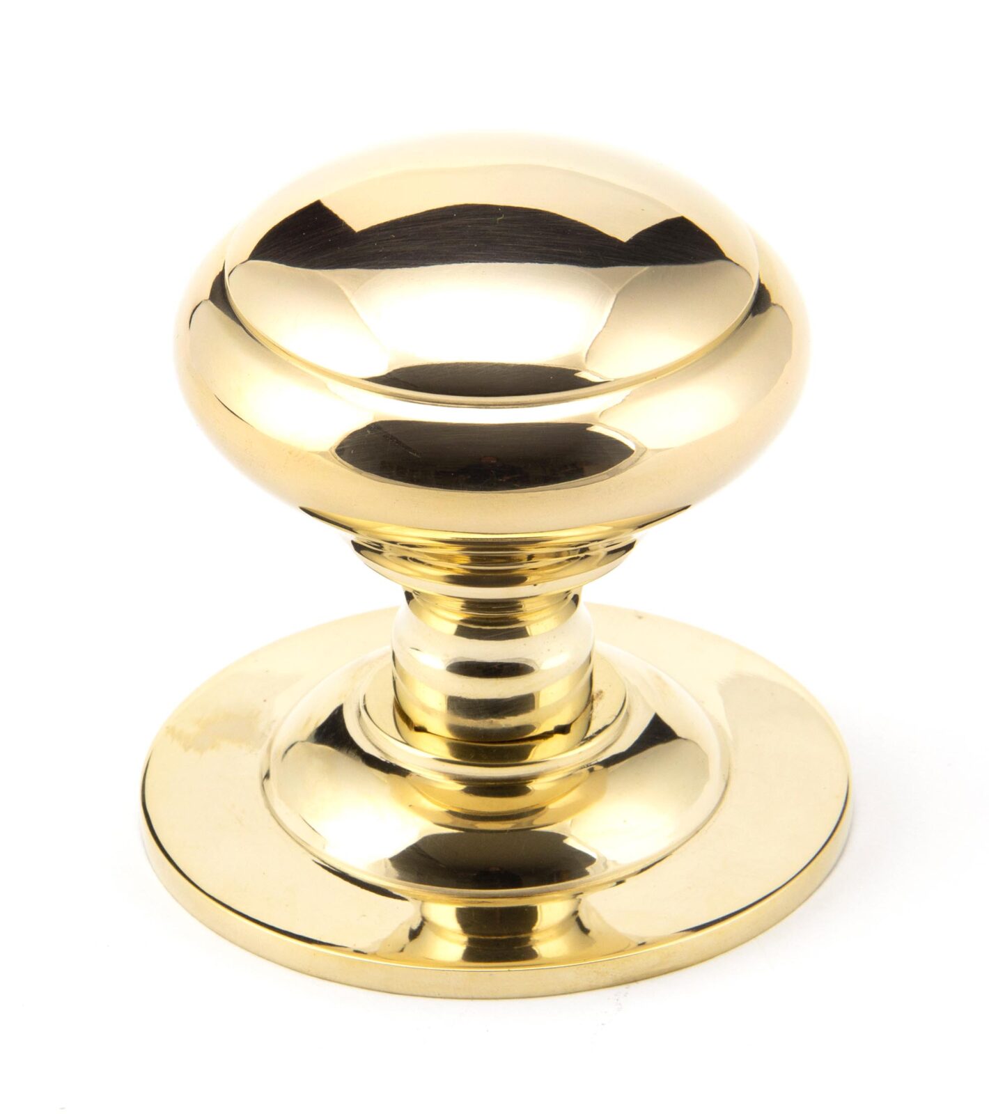 polished brass round centre door knob