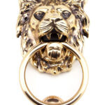 polished bronze lion head door knocker