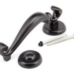 aged bronze doctors door knocker