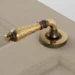 classic hammered lever handles (pair) aged brass