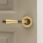classic hammered lever handles (pair) aged brass