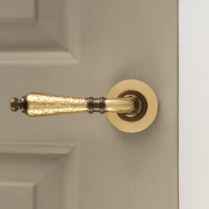classic hammered lever handles (pair) aged brass