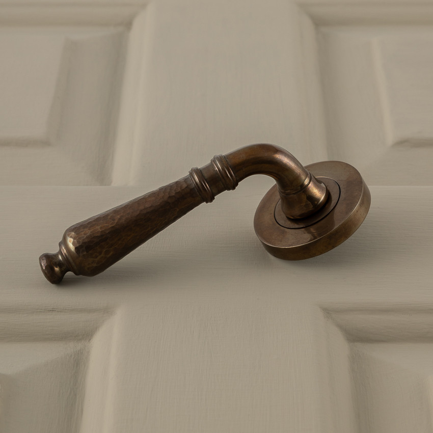 classic hammered lever handles (pair) antique brass