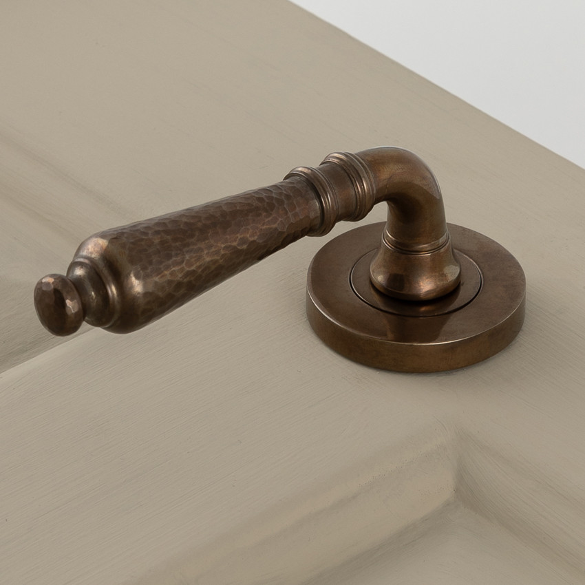 classic hammered lever handles (pair) antique brass