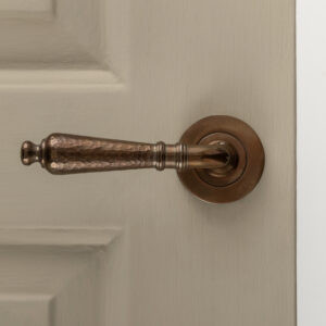 classic hammered lever handles (pair) antique brass